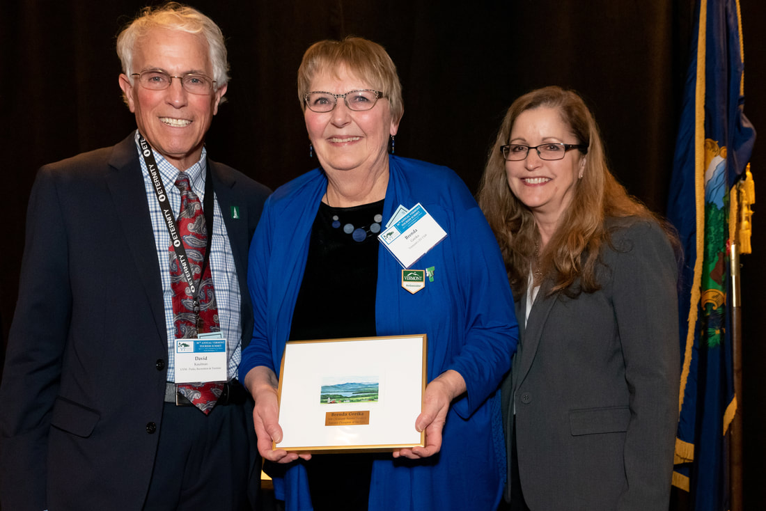 2019 Christiane Skinner Vermont Tourism Champion of the Year award recipient Brenda Grieka (center). 